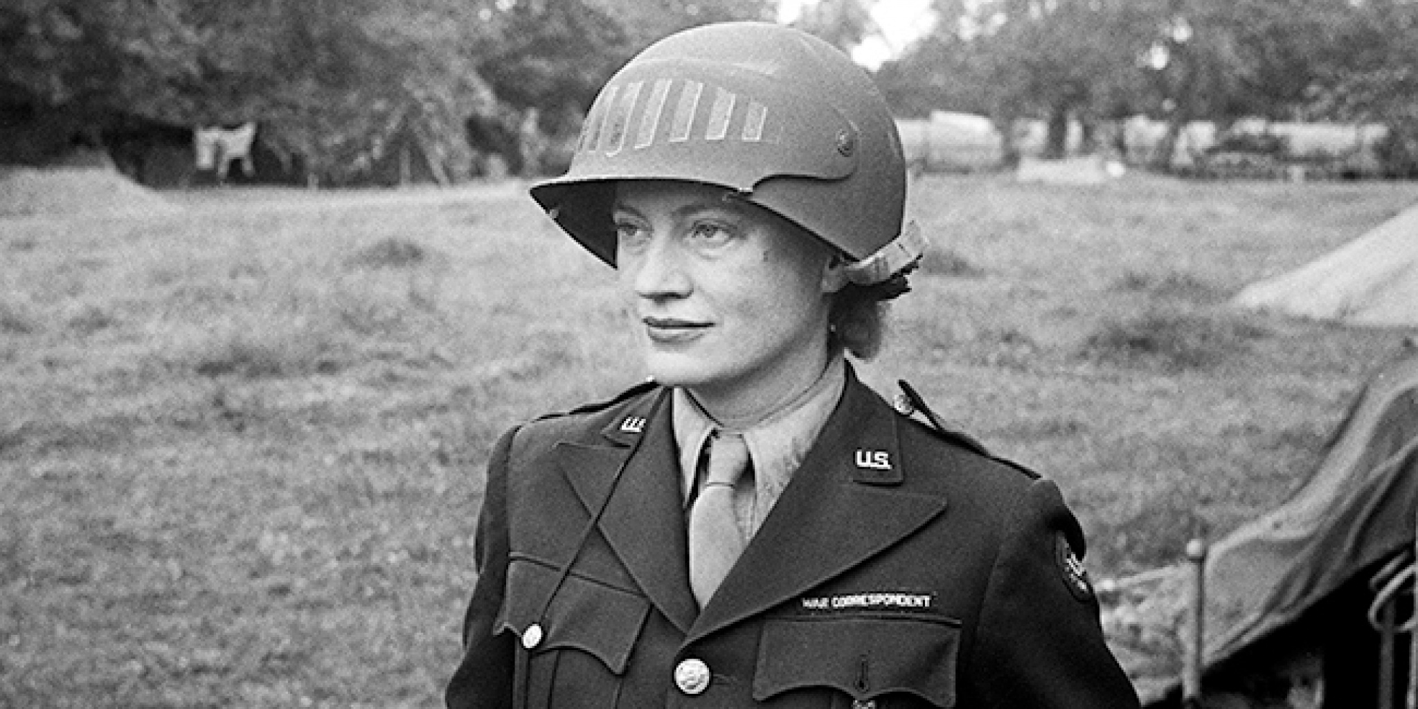 Lee Miller in steel helmet specially designed for using a camera, Normandy, Unknown Photographer, 1944