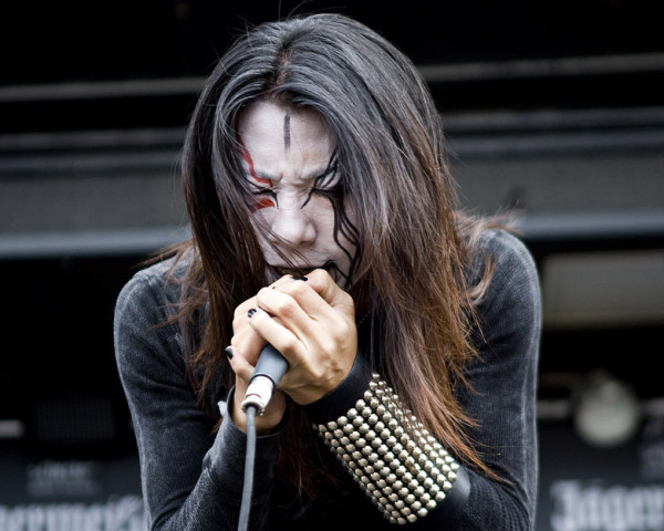 Vocalist Freddy Left Face of Maradau of the Taiwanese based melodic black metal band Chthonic performs with the band on the second stage at Ozz Fest 2007 tour stop in Mansfield, Mass., Monday, Aug. 20, 2007. (AP Photo/Robert E. Klein)