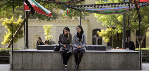Tehran, Iran - October 18: A young woman with scarf on the phone on October 18, 2015 in Tehran, Iran. (Photo by Thomas Koehler/Photothek via Getty Images)